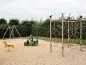 Preview: Mira climbing system with additional play equipment on the adventure playground Preview: Mira climbing system with additional play equipment on the adventure playground